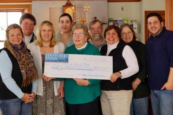Participating business representatives from the 11th Annual Pies on Parade Pie Tour gathered at the Granite Inn to present a check for $25,695 to the Area Interfaith Outreach (AIO) Food Pantry and Fuel Assistance Program. Pictured here from left to right: Lynn Archer (Archer’s on the Pier), Pinny Beebe-Center (AIO), Kimberly Snow (Snowdrop Confections), Nicole Payson (FIORE Olive Oils and Vinegars), Linda Pieper (AIO), Edwin Hantz (Granite Inn), Cheryl Michaelsen (Berry Manor Inn), Joan Hantz (Granite Inn), PJ Walter (LimeRock Inn). Photo by PJ Walter.