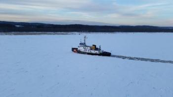 ‘Thunder Bay’ pulls aside in an unbroken ice field as larger ship passes near Hudson, New York. (Photo courtesy U.S. Coast Guard)