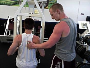 Jack Hauprich, right, works with a client he is training. (Courtesy of Chris Chacon)