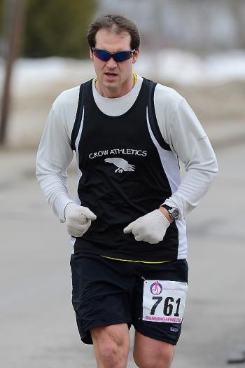 Darren Winchenbach of Auburn finished fourth with a time of 19:38. (Photo by Ron Hawkes)