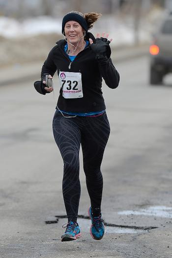 Tiffany LaClair of Searsmont waved as she went by on Thomaston St. (Photo by Ron Hawkes)
