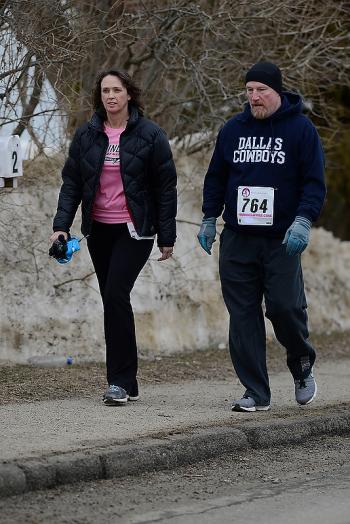 Deb, left, and Richie Oliver walked the 5k Saturday. (Photo by Ron Hawkes)