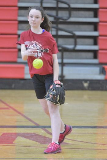 Camden Hills freshman Emily Long works on her delivery. (Photo by Ron Hawkes)