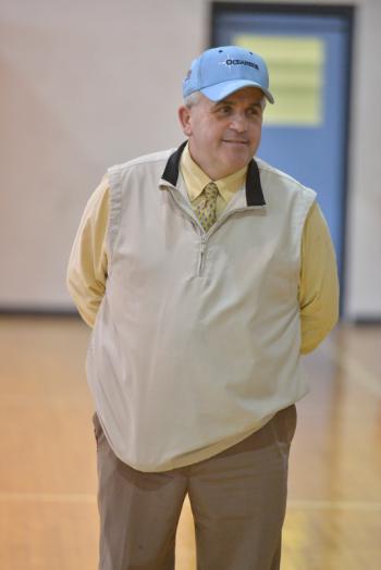 Oceanside coach Rusty Worcester is all smiles as he watches his pitchers and catchers warm up. This is the 15th season at the helm for Worcester between Georges Valley and Oceanside. (Photo by Ron Hawkes)