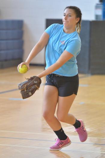 Oceanside’s Emily Tyler, the younger sister of Paige Tyler, not shown, delivers a pitch. (Photo by Ron Hawkes)