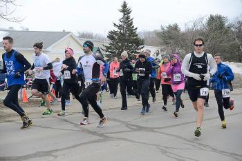 They are off and running on 3/14/15 at 9:26.53, the first 10 digits of Pi, to start the Mid-Coast School of Technology 5K road race Saturday in Rockland. (Photo by Ron Hawkes)