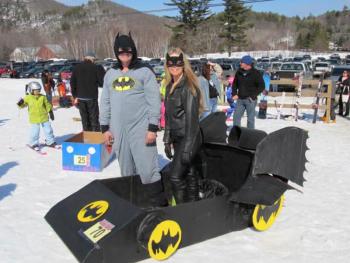 Don’t miss the third annual Cardboard Box Derby at the Camden Snow Bowl Saturday. Pictured: Batmobile with Cub Lewis as Batman and Bedina Austin as Catwoman. (Photo by Kay Stephens)