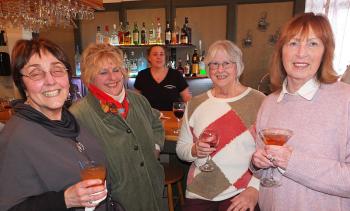 Janet Bosworth, Diane Giese, Nancy Burton and Karen Clarke enjoy the evening to support a good cause.