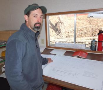 Guy Hews, resident engineer for the state of Maine, at work. (Photo by Chris Wolf)