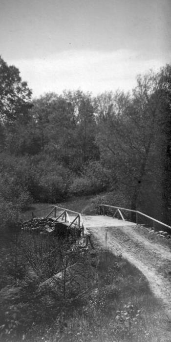 A bridge once spanned every little creek and brook where today an invisible culvert carries the water under the road.
Photo courtesy of Lincolnville Historical Society little bridge