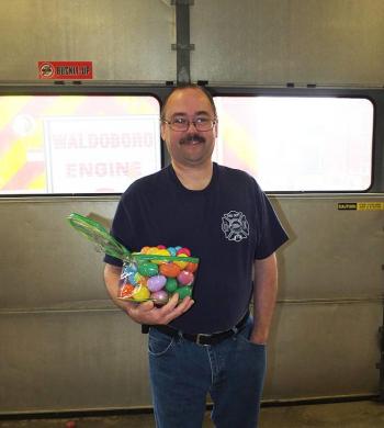 Brian Berry of the Waldoboro Fire Department stands ready with more Easter Eggs to hide.
