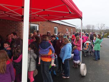 The crowd stretched down and around the building waiting to get in to find eggs.