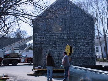 From left, Dwight Henry, who was supervising Monday’s work in Camden and owns Henry Crane Service in Thomaston with his father, Arthur, discusses the operation with Harley Colwell. (Photo by Holly S. Edwards)