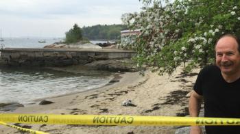 Rockport Public Works Director Mike Young closed off Goodie’s Beach with tape to let the seals have the beach to themselves. (Photo by Lynda Clancy)