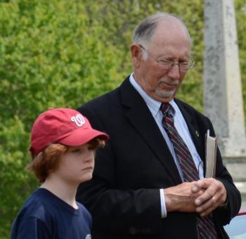 Rev. Ralph Miller with a boy scout. (Photo by Lynda Clancy)