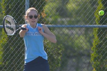 Oceanside’s Clara Feltus returns this hard hit during Tuesday’s match against Lincoln Academy. (Photo by Ron Hawkes)