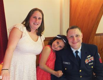 Adam Lempke with wife Laura and daughter Madison