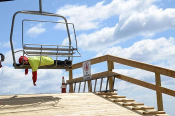Everyone needs to rest now and then on the chairlift. (Photo by Lynda Clancy)