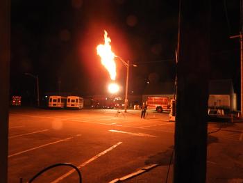 Rockland firefighters had to use a combination of water fog streams and ‘flaring,’ shown here, to disperse the propane vapors and reduce pressure to make it safe to drain the remaining liquid fuel and make repairs to the leak. (Courtesy Rockland Fire Department)