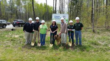 Supporters of the Pope Memorial Humane Society pose at the groundbreaking ceremony for the new shelter in Thomaston. From left are Mike Steitzer of MSA Architects in Topsham, John Davee of Maine Coast Construction, Pope Memorial Board President Kim Grinnell, Pope Memorial Executive Director Tracy Sala, service dog Max and his owner and the shelter’s benefactor, Lyman Pope, Capital Campaign Chairman Kathy Cuthbertson and Building Committee Chairman Warner Vaughn. (Photo by Sarah Shepherd)
