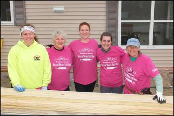Working for the day in Thomaston on the Midcoast Habitat for Humanity house are left to right, Nevin Sabatini, Annie Mahoney, Sarah Whitmore, Alex Hodges and Nancy Killoran. (Photos by Chris Wolf)