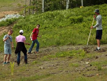 Then it’s time to spread the seeds, rake and spread some more. (Photo by Holly S. Edwards)
