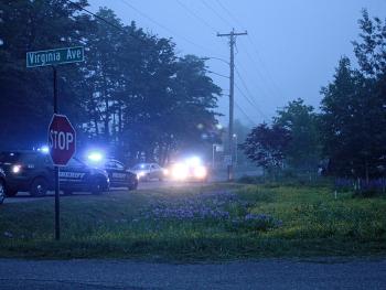Camden Sgt. Dan Brown and officers Tim Davis and Jeff Boudreau responded to the area of Tuesday night’s domestic incident involving an armed man and set up a perimeter between Virginia Avenue, and Union and Limerock street. They were assisted by officers from the Knox County Sheriff’s Office, Maine Warden Service, Rockport Police Department and Maine State Police. (Photo by Holly S. Edwards)