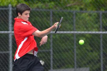 Camden’s Matt Morse returns a serve during his No. 3 singles match Wednesday. Morse’s win gave the Windjammers the match who went on to win 4-1 over Presque Isle. (Photo by Ron Hawkes)
