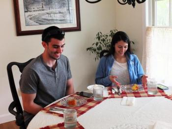 Luke Paul and Christina Quach enjoy their wedding cake tasting at Starlight Custom Cakes in Boothbay on June 5. SUZI THAYER/Boothbay Register