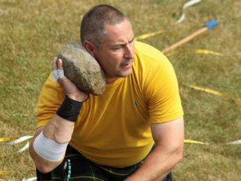 Open stone throwing kicked off the 2015 Highland Heavy Games on Belfast’s waterfront Sunday. The games continue all day and the Maine Celtic Celebration is open to the public, by donation only. (Photo by Holly S. Edwards)