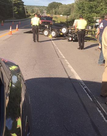 Eugene Neild’s motorcycle left behind a long skid mark after he attempted to stop from crashing into the truck and trailer that turned in front of him in Warren. (Photo by Holly S. Edwards)