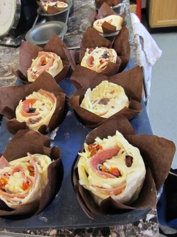 One of Valenti’s Italian/American fusion style salami wraps with provolone and sun-dried tomatoes and black olives. (Photo by Kay Stephens)