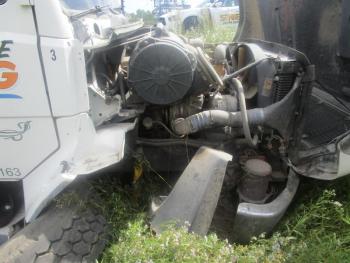 The crash into the field off Fort Knox Road in Prospect caused significant front end damage to the dump truck. (Courtesy Waldo County Sheriff’s Office)