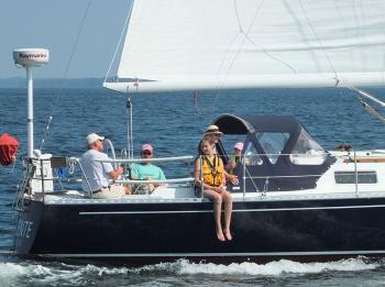 People aboard the Caliente as we pass on the water.