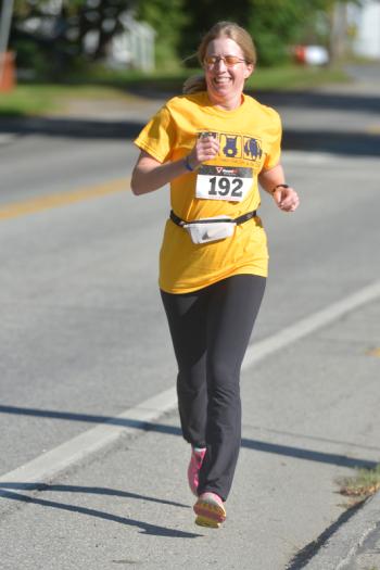 Kate Varns of Minnesota was the first female to cross the finish line. (Photo by Ron Hawkes)