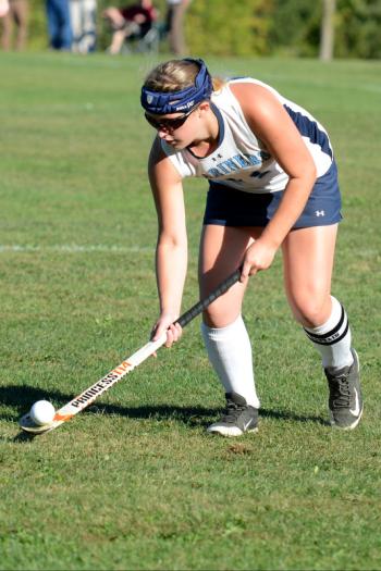 Oceanside’s Krissy McNichol does a little balancing of the ball as she gets ready to make a pass. (Photo by Ron Hawkes)