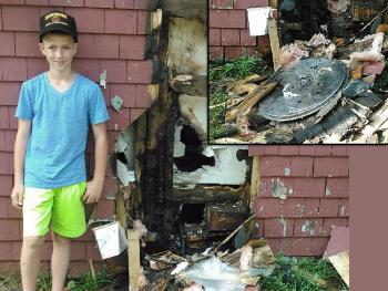 Quick-thinking Lincoln Graf,12, of Searsmont, stands by debris caused by a fire he extinguished at his house Wednesday afternoon. Inset: The aluminum pot lid that is thought to have caused the fire when sun beating on it reflected onto the cedar shingles and caught fire. (Courtesy Searsmont Fire Department)