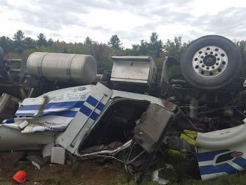 Scott Ware of Gardiner was driving this 2010 Peterbilt 18-wheeler hauling a flatbed trailer loaded with Fisher snowplows and equipment when he drove off the road at a curve and the truck traveled more than 300-feet and rolled onto its roof. (Courtesy Knox County Sheriff’s Office)