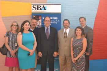 From left to right: Jaimie Logan, Governor’s Account Executive, Maine Department of Economic and Community Development; Kate McAleer, Owner of Bixby & Company; Frank Isganitis, Mayor of Rockland; Seth Goodall, Small Business Administration Regional Administrator; Joel Neal; Audra Caler-Bell, Community Development Director, City of Rockland; and Jim Chaousis, Rockland City Manager.