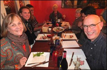 Patrons enjoy the 15 course meal on Saturday.