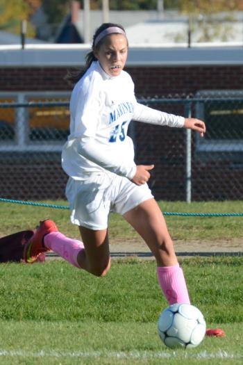 Oceanside’s Abby Veilleux brings the ball down the sideline trying to get a shot off. (Photo by Ron Hawkes)