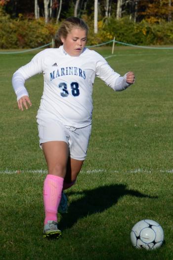Oceanside's Chloe Jones brings the ball towards the goal. (Photo by Ron Hawkes)