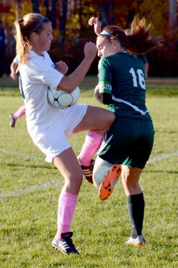 Oceanside’s Brianna Dugan, left, and Mount View’s Ryleigh Lord battle for a 50/50 ball. (Photo by Ron Hawkes)