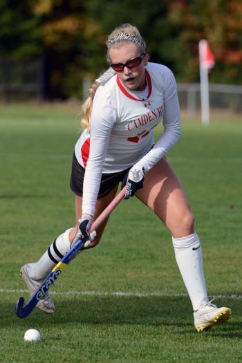 Camden Hills Willow Grinnell takes the long corner for the Windjammers. (Photo by Ron Hawkes)