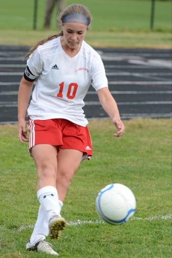 Camden’s Charlotte Messer delivers a corner kick during Saturday’s game. (Photo by Ron Hawkes)
