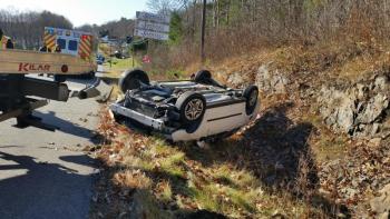 Steve Laite of Camden Exxon, removes the vehicle from the ditch on Route 1.
Photo by Sarah Shepherd.