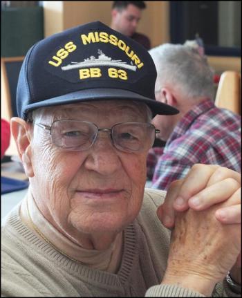 Bill Deptula served on the USS Missouri in 1948. He said he was not part of the signing of the treaty ending the war that took place on the famous ship, but he was in the spot where it happened. This photo was taken at the Camden Hills Regional High School National Honor Society’s Veterans Day breakfast in 2014. (Photos by Chris Wolf)