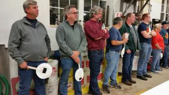 The crowd is waiting to open their bids during the live auction. (Photo by Sarah Shepherd)