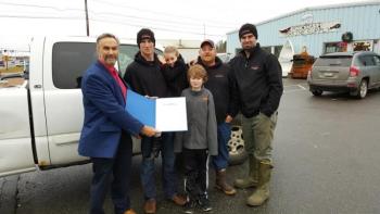 State Senator Dave Mirimant presents Noah Ames, his family and crew a proclamation expressing the State of Mainers gratitude for his generosity.