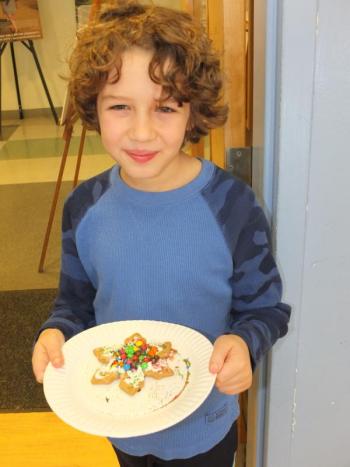 Ethan Ratner decorates a cookie. (Photos by Chris Wolf)